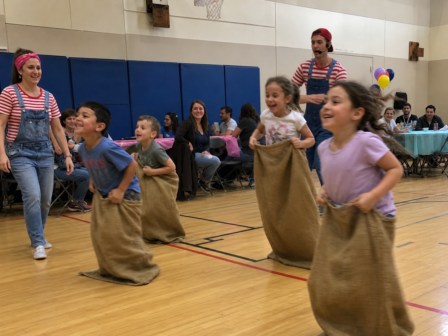 Children enjoying a potato sack race